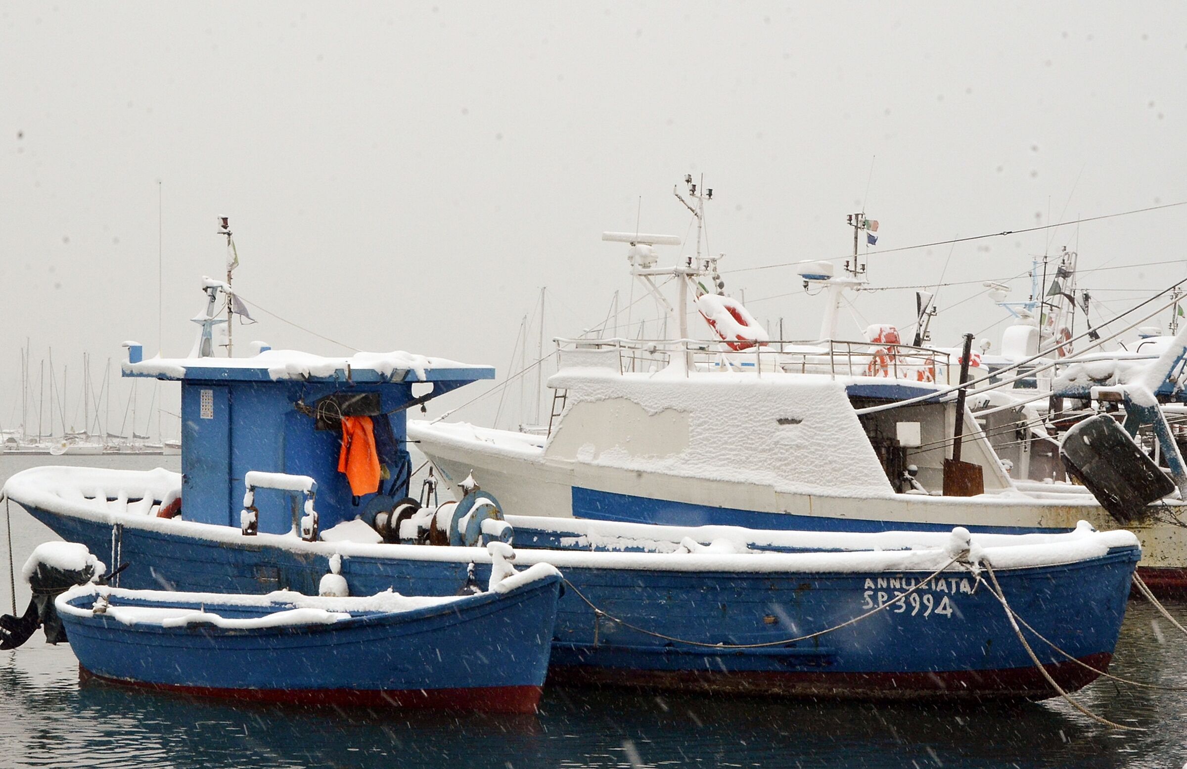 Fishing boats under The snow...