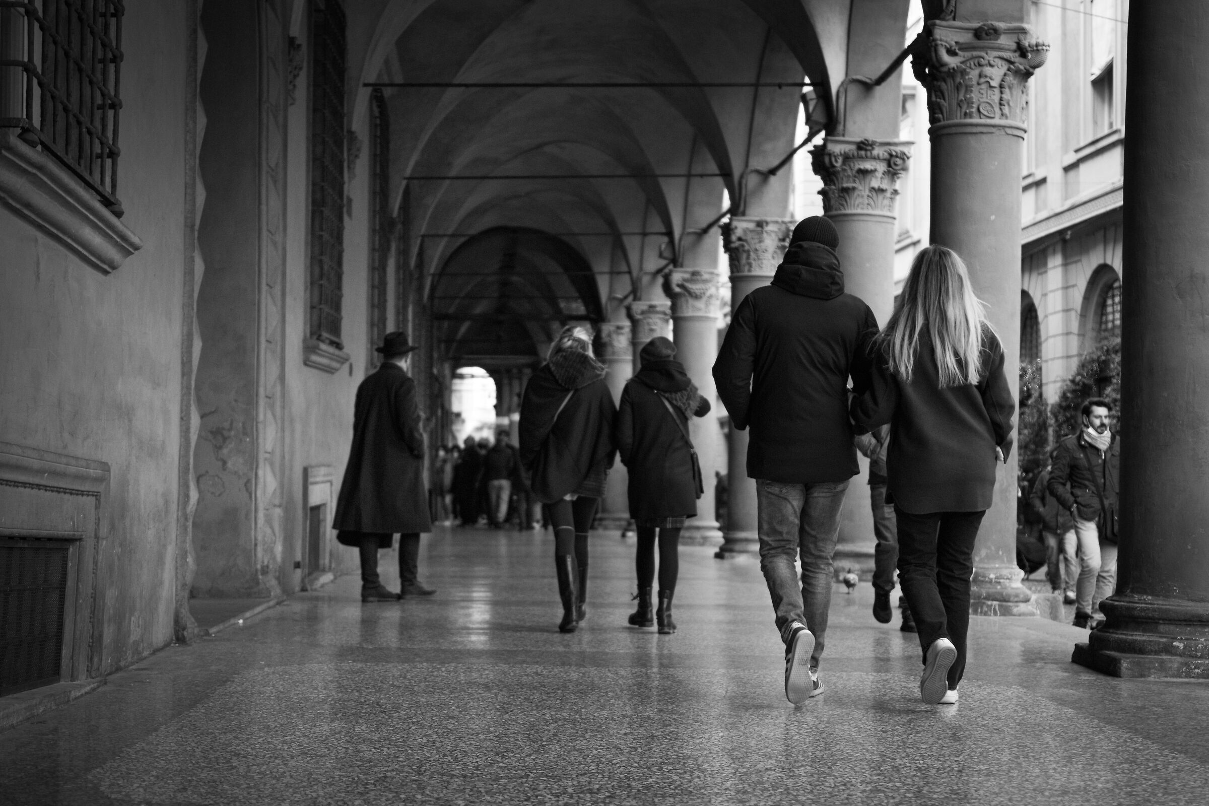 Walking under the arcades of Bologna...