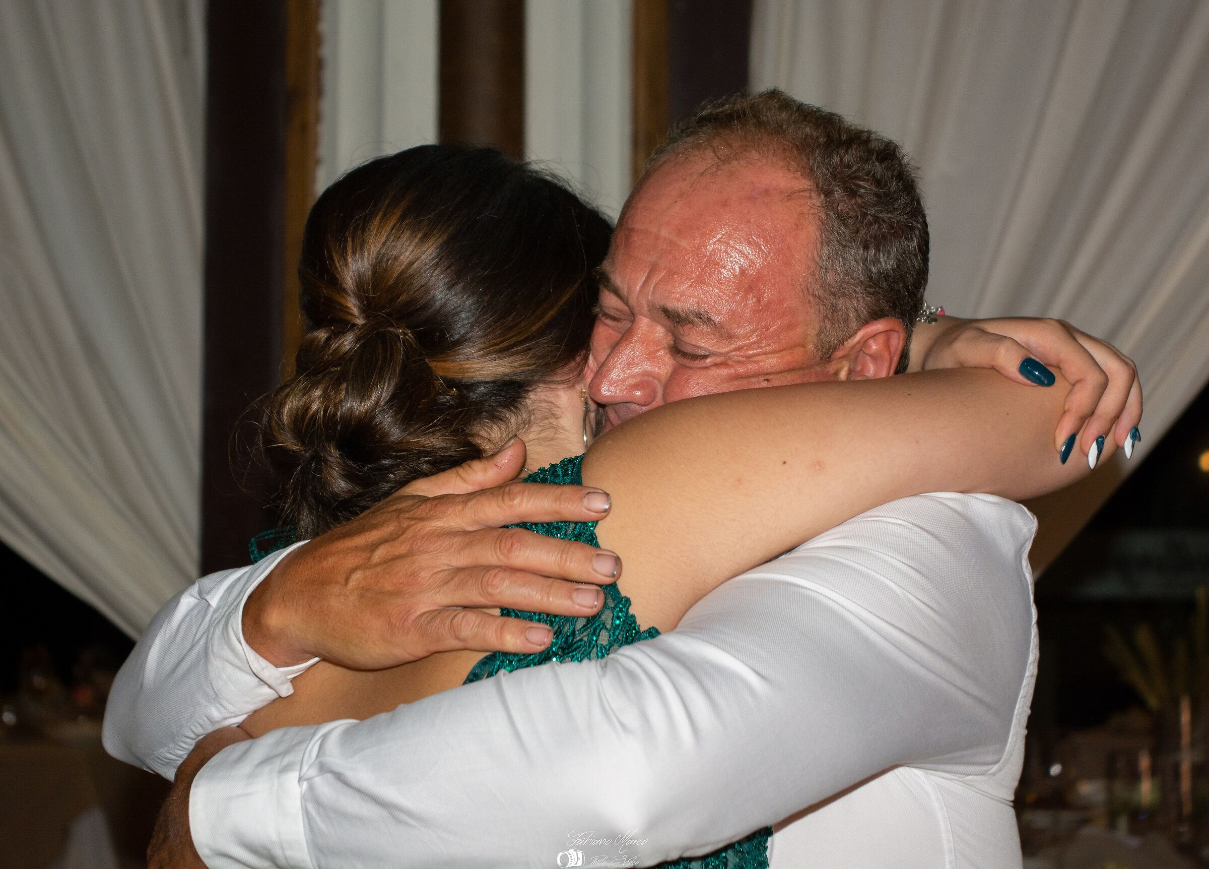 The embrace of a father and a daughter ...