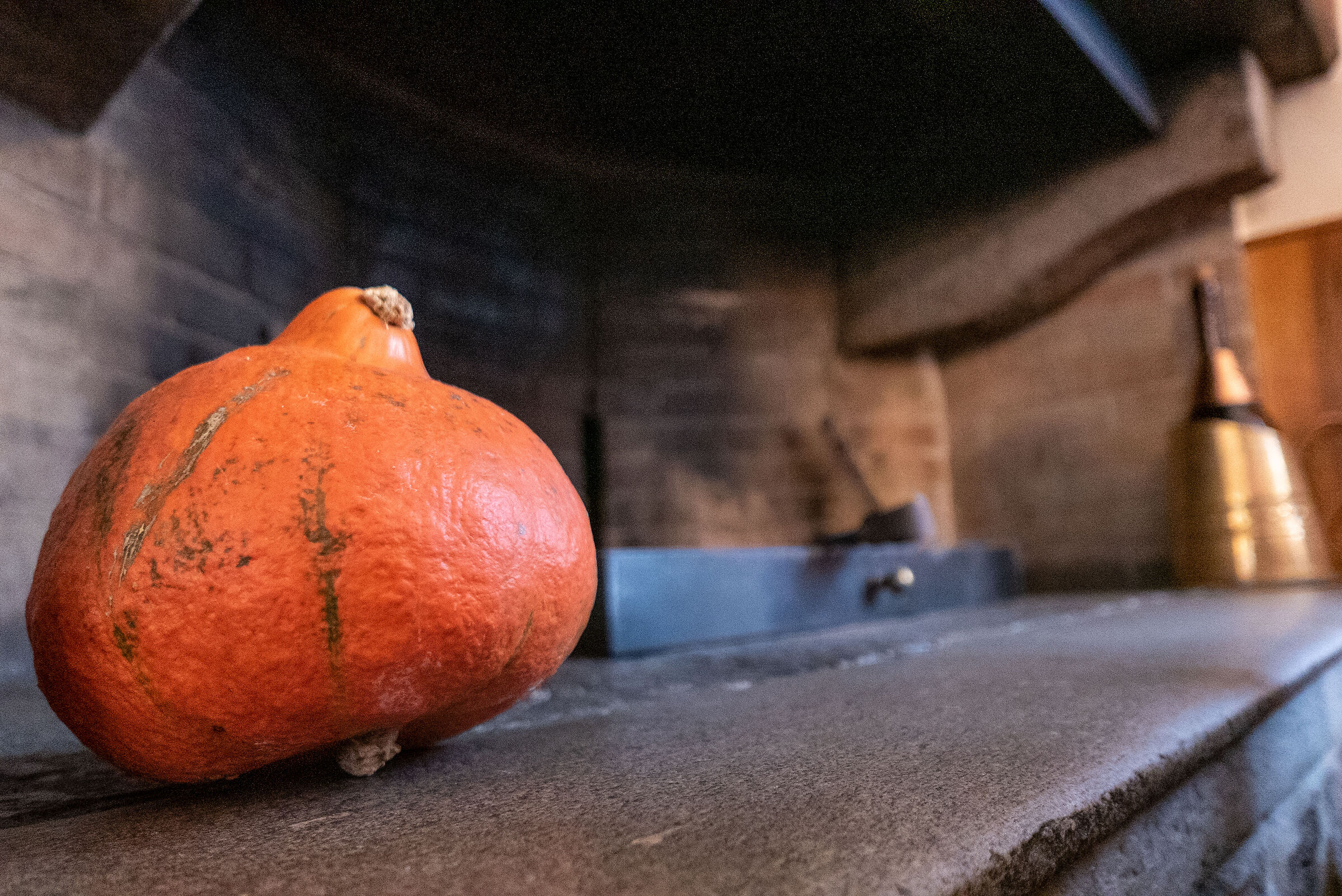 The pumpkin in the fireplace...