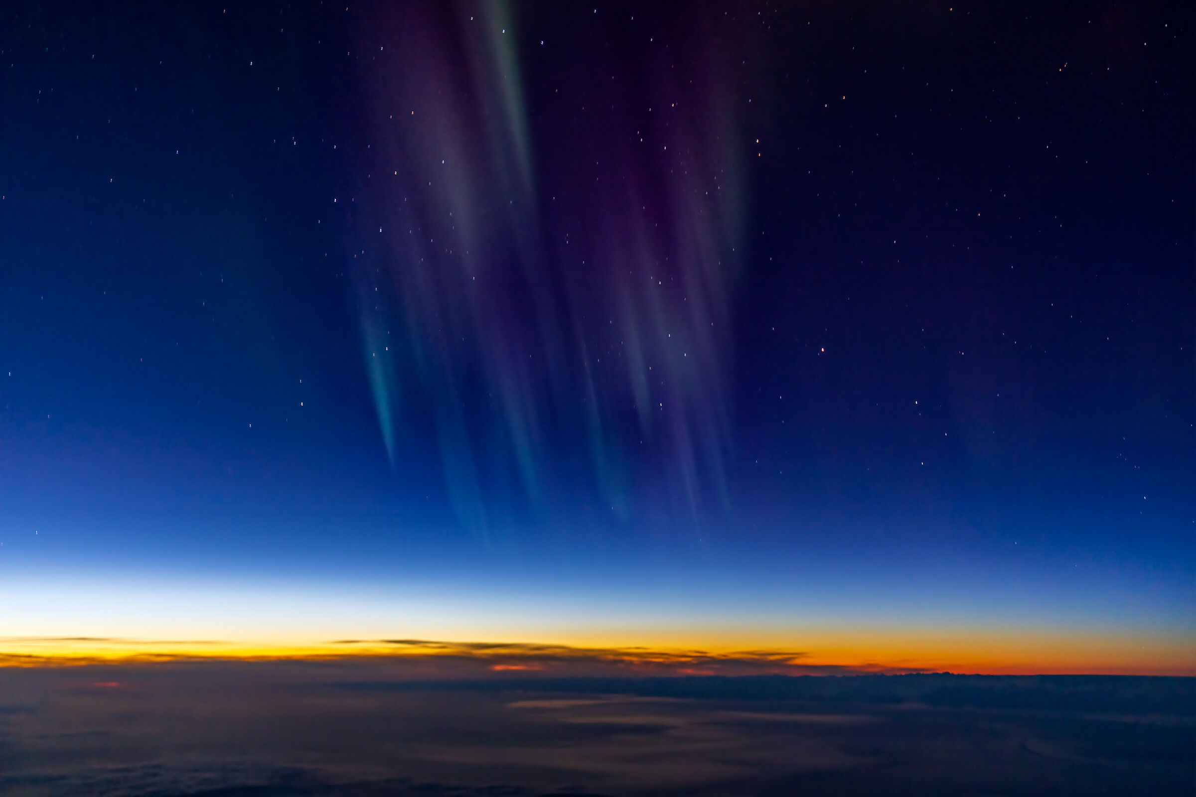 Borealis 66N over Greenland (sunset time) ...