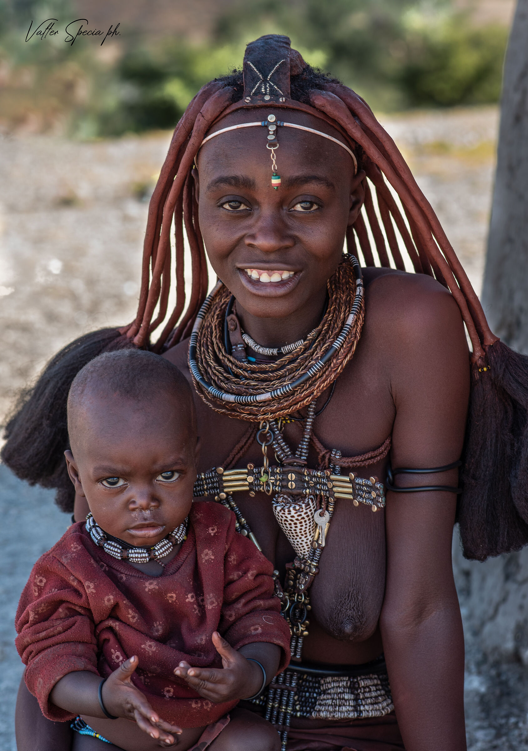 Himba girl with son, Namibia,...