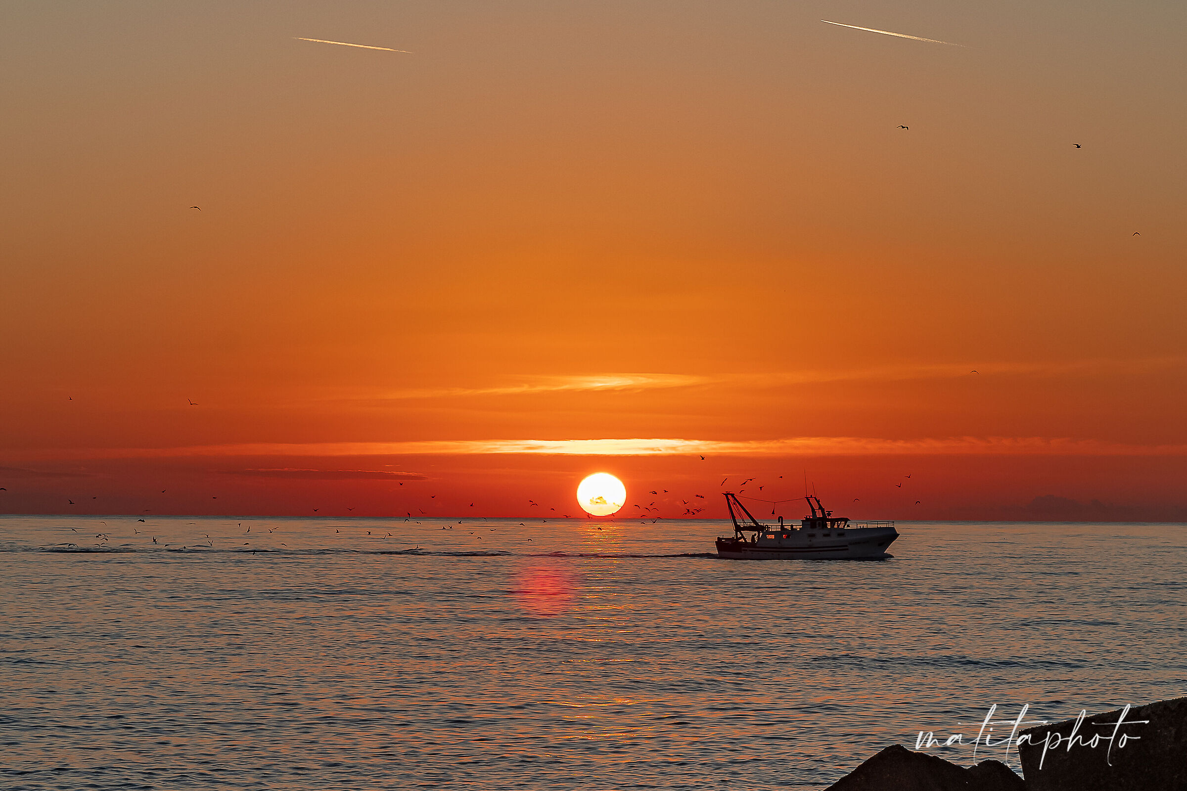 Sunset with fishing boat...
