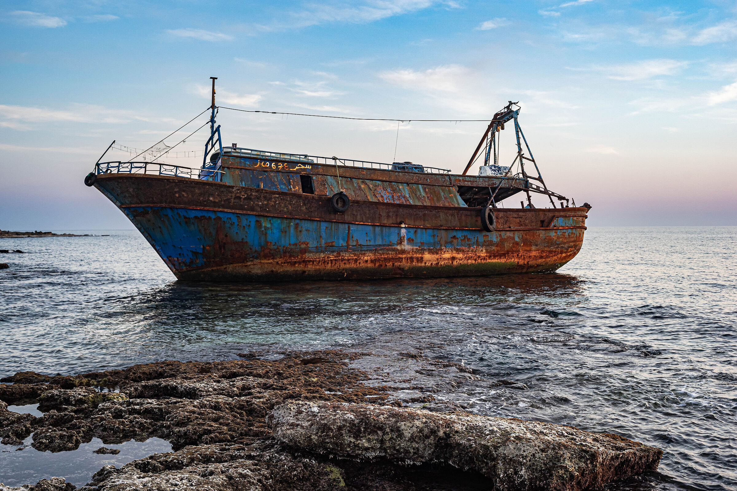 An African fishing boat adrift - Salento...