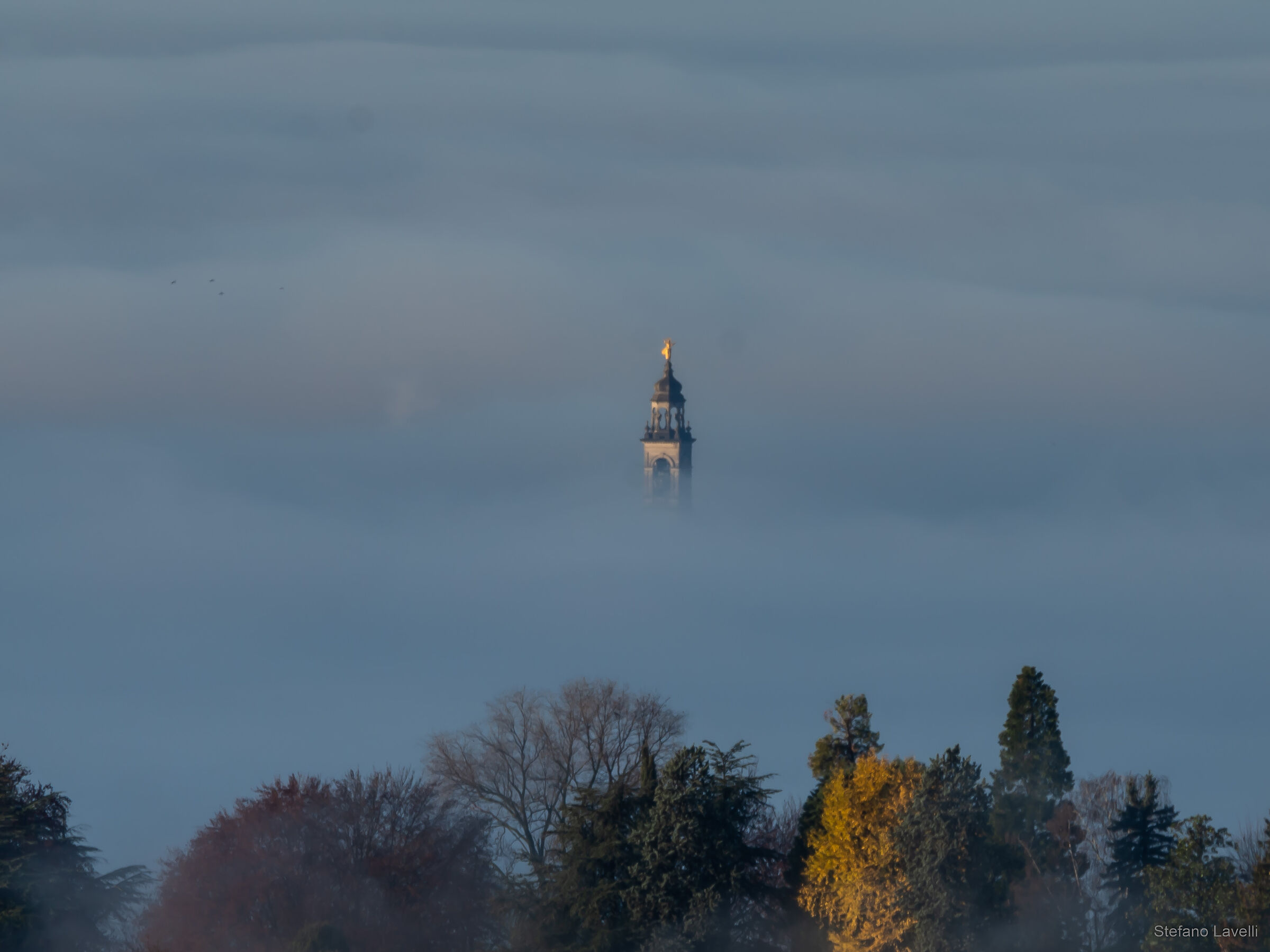 Bell tower emerging from the fog...