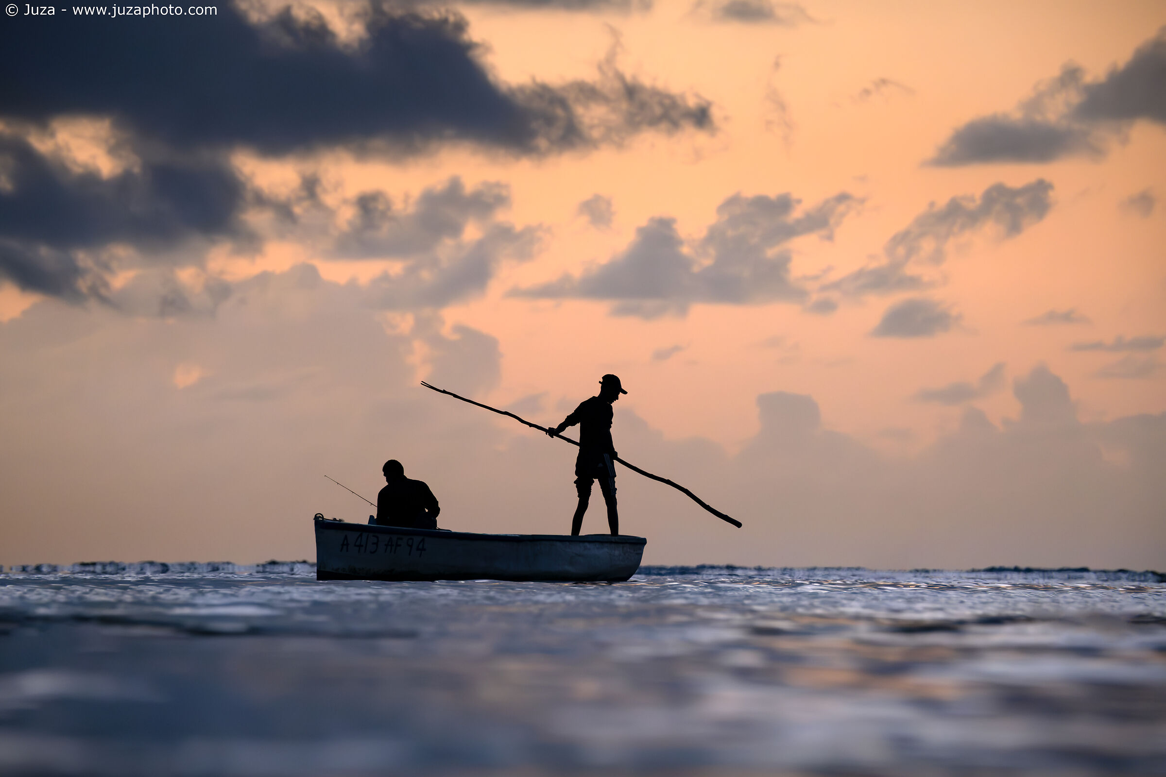 Fishermen at sunset, Mauritius...