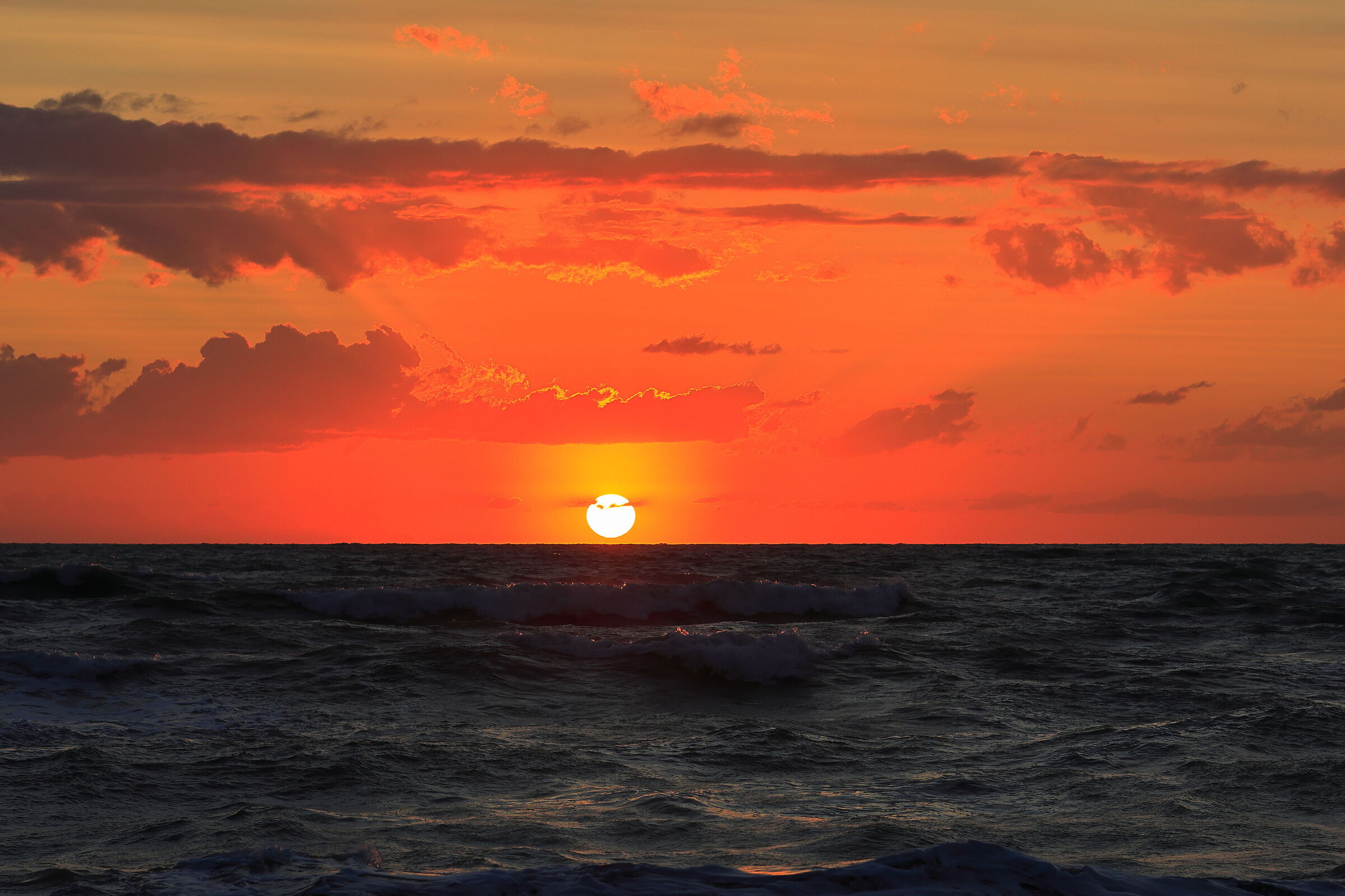 Sunset over rough seas...