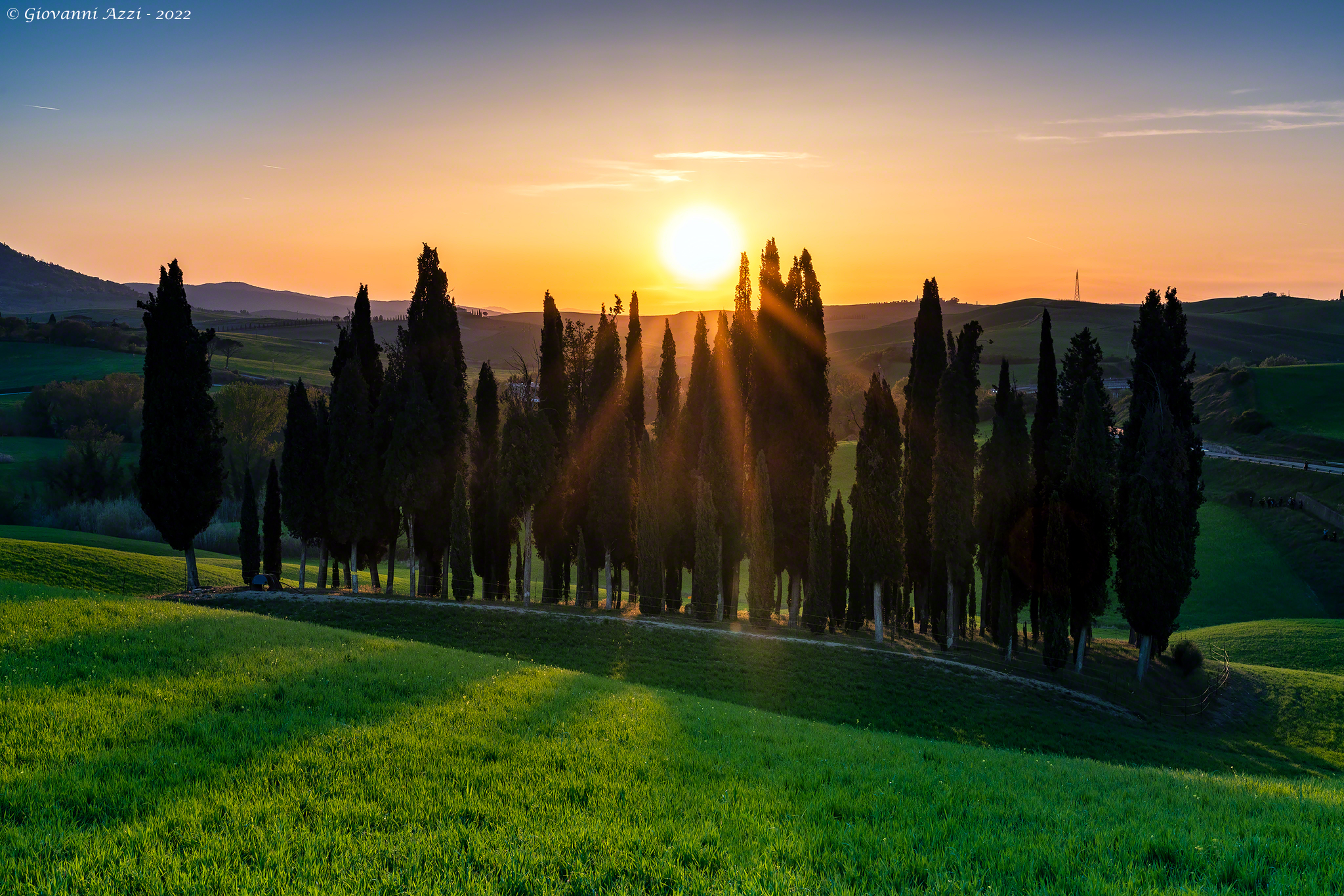 Sunset with cypresses...