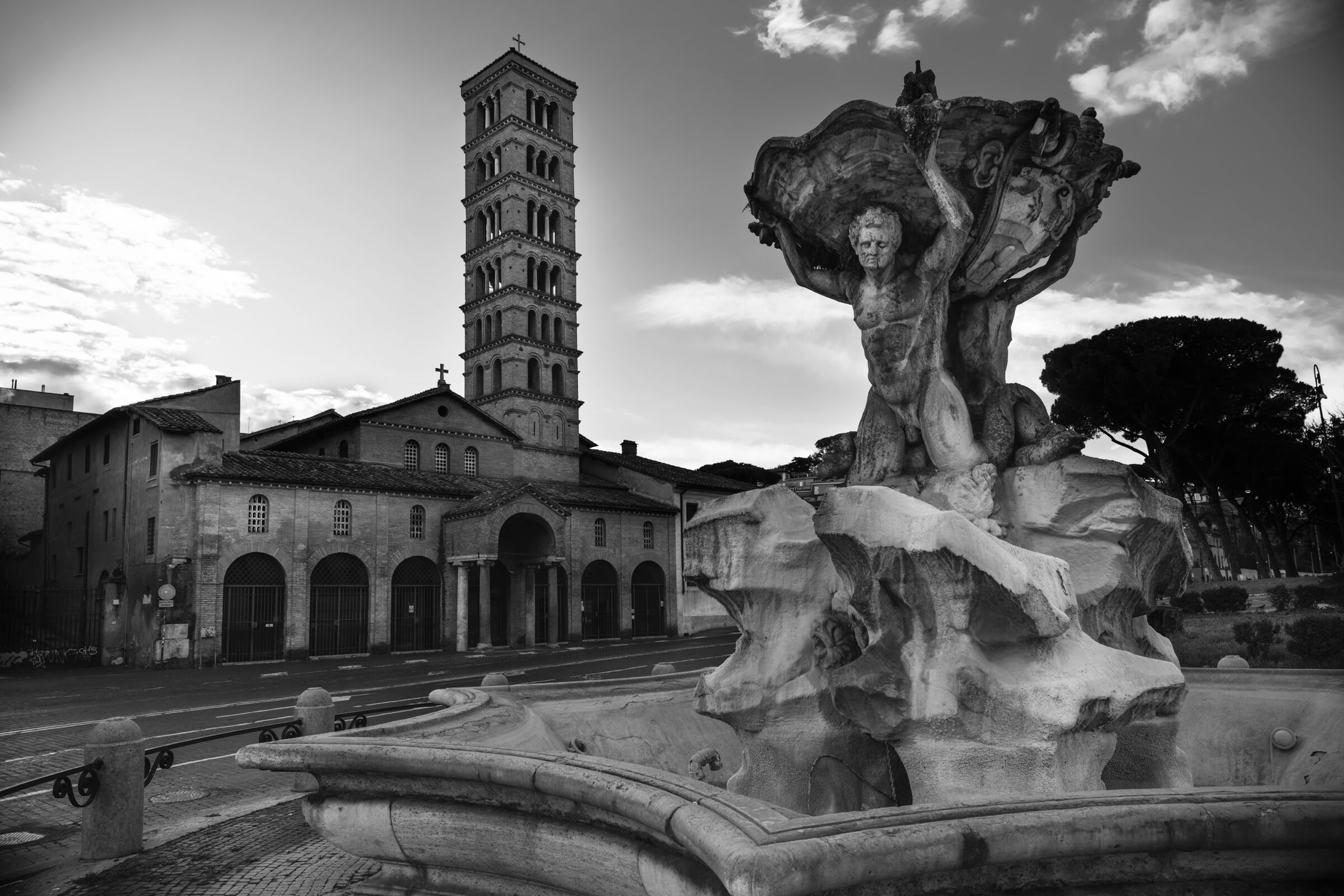 Fountain of the Tritons and Santa Maria in Cosmedin....