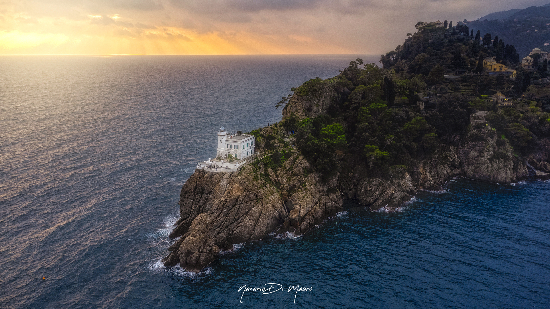 Magic sunset at the lighthouse of Portofino...