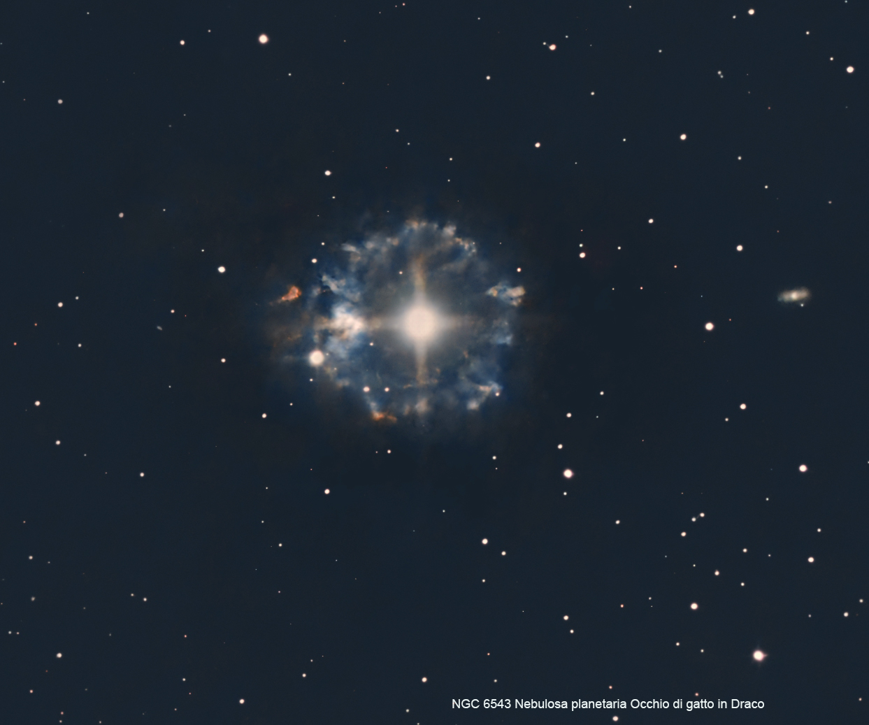 NGC 6543 Cat's eye planetary nebula in Draco...